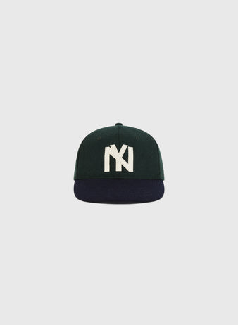 The Ebbets Field BK Eagles 1935 Authentic Ballcap is dark green with a navy brim and large white embroidered 