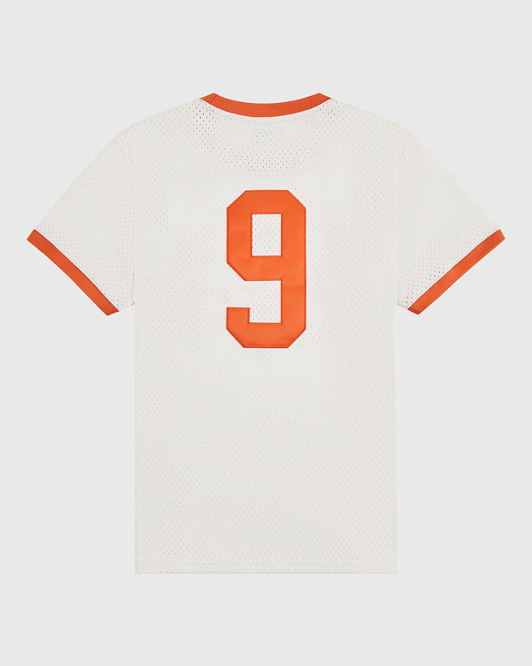 The Dallas Tornado Mesh Soccer Jersey by Ebbets Field features white mesh, orange trim, and a bold orange number 9 on the back, inspired by the classic NASL championship-era Dallas Tornados jerseys.