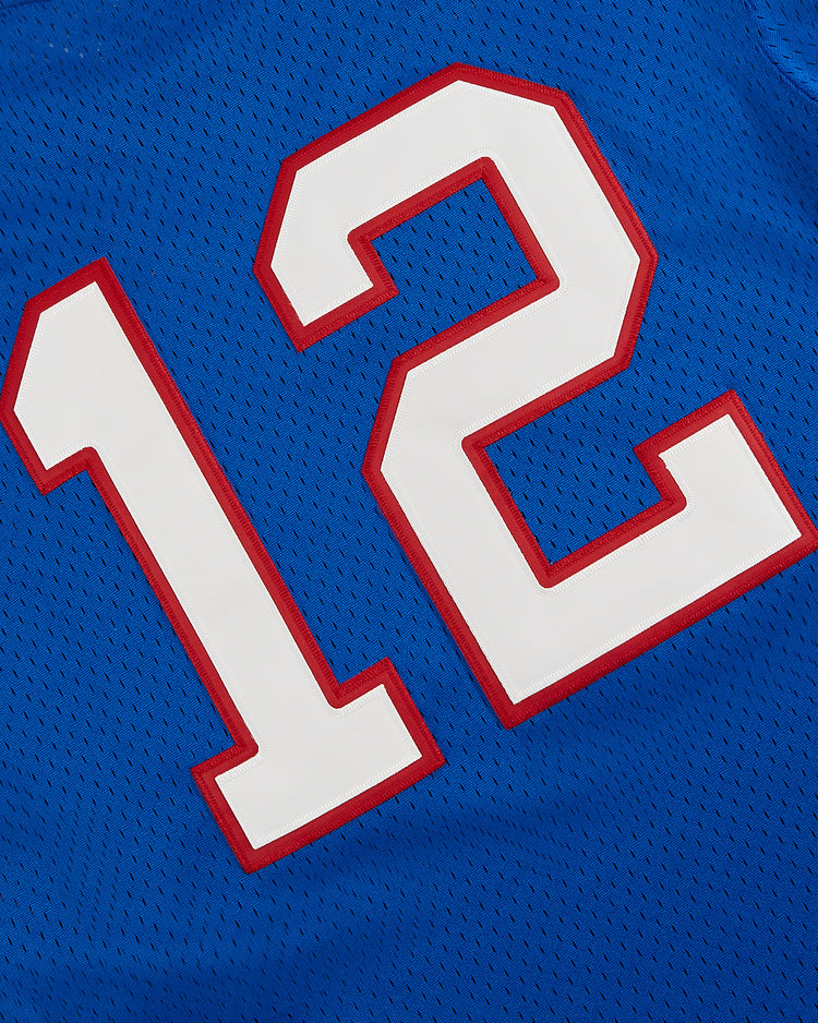 Ebbets Field New Jersey Americans Mesh Soccer Jersey in blue, featuring large white number 12 with red outline—classic mesh texture inspired by vintage athletic uniforms.