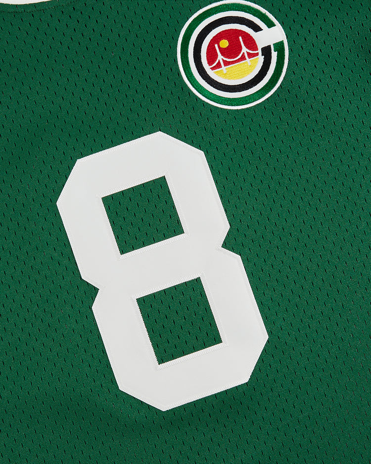 The Ebbets Field San Francisco Golden Gate Gales Mesh Soccer Jersey is green mesh with a large white number 8 and a circular patch (basketball, crown, stylized G) on the top right, inspired by classic Gales designs.