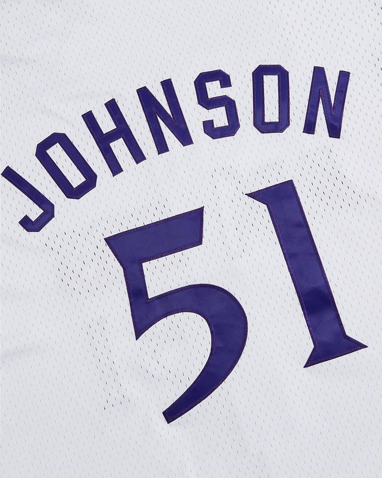 The Ebbets Field Randy Johnson El Paso Diablos Button Up Mesh Jersey is a white mesh baseball jersey adorned with the name Johnson and the number 51 in bold blue lettering, echoing the classic style worn by Randy Johnson during his tenure with the El Paso Diablos.