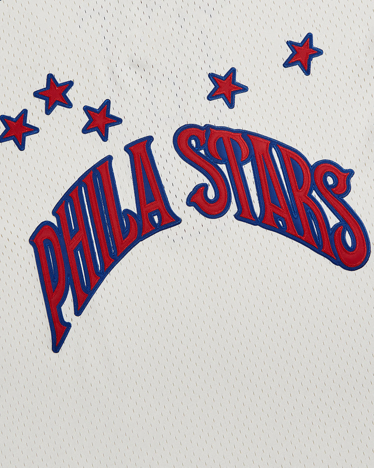 Crafted by Ebbets Field, the Philadelphia Stars V-Neck Mesh Jersey features breathable white mesh fabric adorned with bold red and blue 