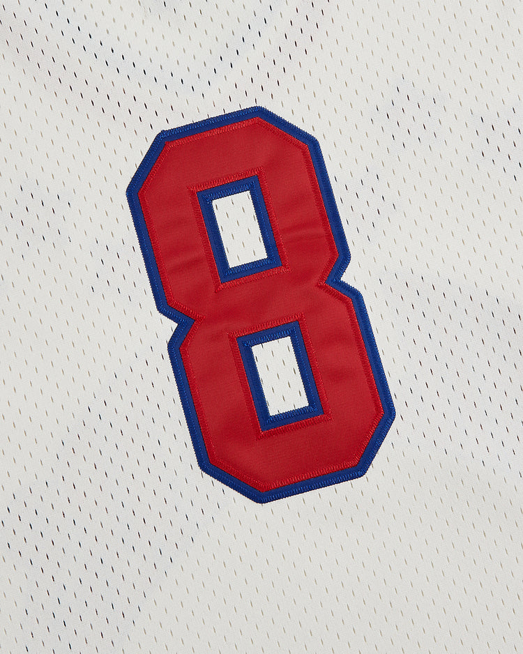 A large red number 8 outlined in blue is displayed on the white mesh fabric of the Ebbets Field Philadelphia Stars V-Neck Mesh Jersey, evoking the classic style of the Negro National League team.