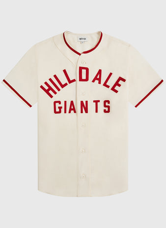 Introducing the Hilldale Giants 1929 Wool Home Authentic Jersey by Ebbets Field—a cream-colored, authentic wool jersey featuring red trim and buttons. HILLDALE GIANTS is emblazoned in bold red letters across the front, echoing the legendary uniforms worn by the Hilldale Giants during their historic 1929 Negro League baseball season.