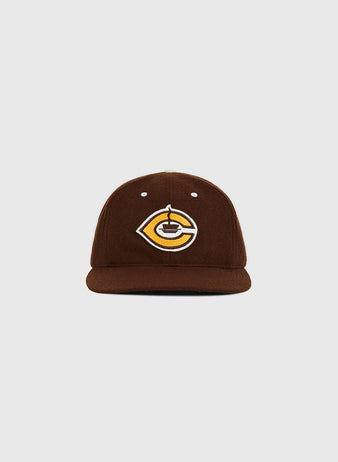 The Cordoba Cafeteros Authentic Wool Ballcap by Ebbets Field is a brown baseball cap featuring a yellow and white embroidered stylized 