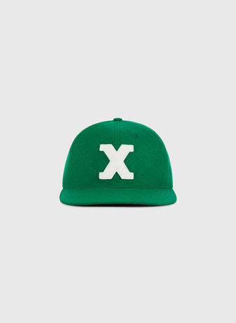 A Xalapa Chileros 1963 Authentic Wool Ballcap by Ebbets Field, featuring a large white letter X on the front, displayed against a plain light gray background.