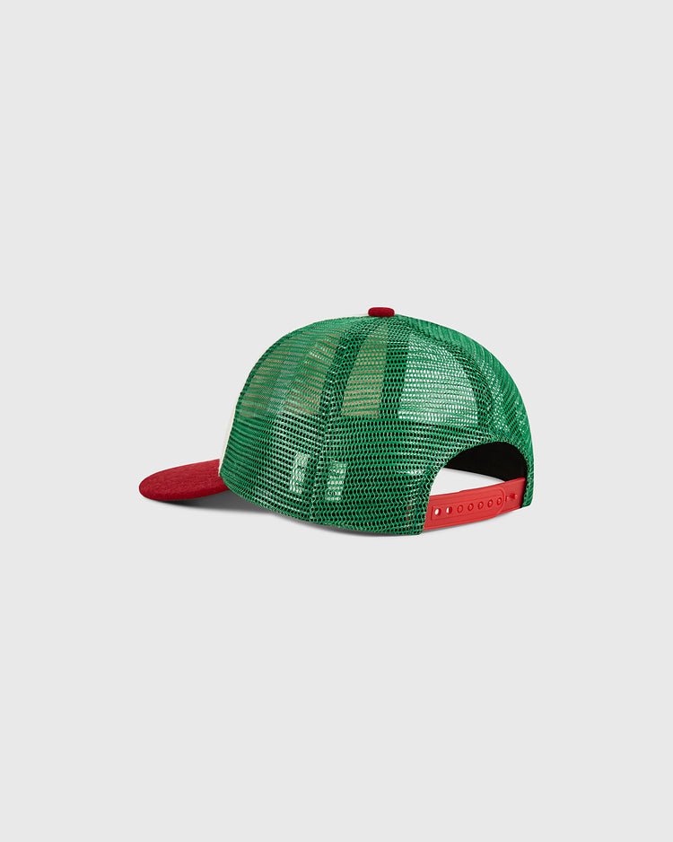 Introducing the Ebbets Field Mexico Wool Mesh Trucker Ballcap, featuring a distinctive red front bill paired with a green wool crown. The cap is finished with green mesh panels at the back and a red adjustable snap closure. Shown against a light gray background.