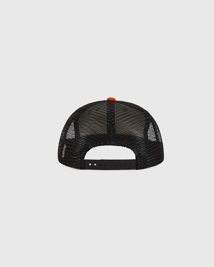 Back view of the Ebbets Field Tokyo Giants Wool Mesh Trucker Snapback, featuring black wool mesh panels, an adjustable black plastic snapback closure, and a small orange button on the crown. This hat is inspired by vintage baseball cap styles and classic Tokyo Giants headwear, shown isolated against a light gray background.