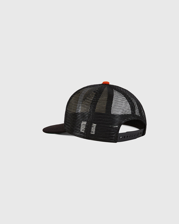 The Ebbets Field Tokyo Giants Wool Mesh Trucker Ballcap is shown from the back, highlighting its adjustable snapback closure and curved brim against a plain light gray background—this timeless design seamlessly captures the classic appeal of a vintage baseball cap.