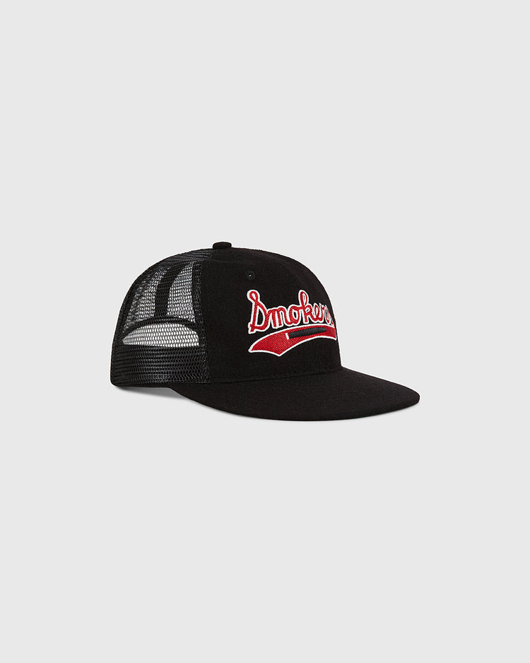 The Ebbets Field Tampa Bay Smokers Mesh Trucker Ballcap is a black mesh trucker hat with a flat bill, featuring 