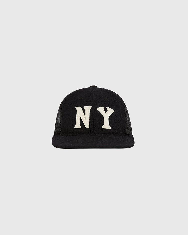 The New York Black Yankees Mesh Trucker Ballcap by Ebbets Field features large white 
