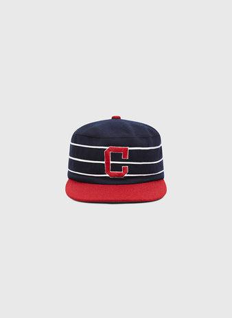 The Ebbets Field Charleston Charlies Pillbox Cap is a retro-style navy blue and red hat featuring white horizontal stripes and a bold red “C” on the front, reminiscent of the classic Charleston Charlies design, shown against a simple light gray background.