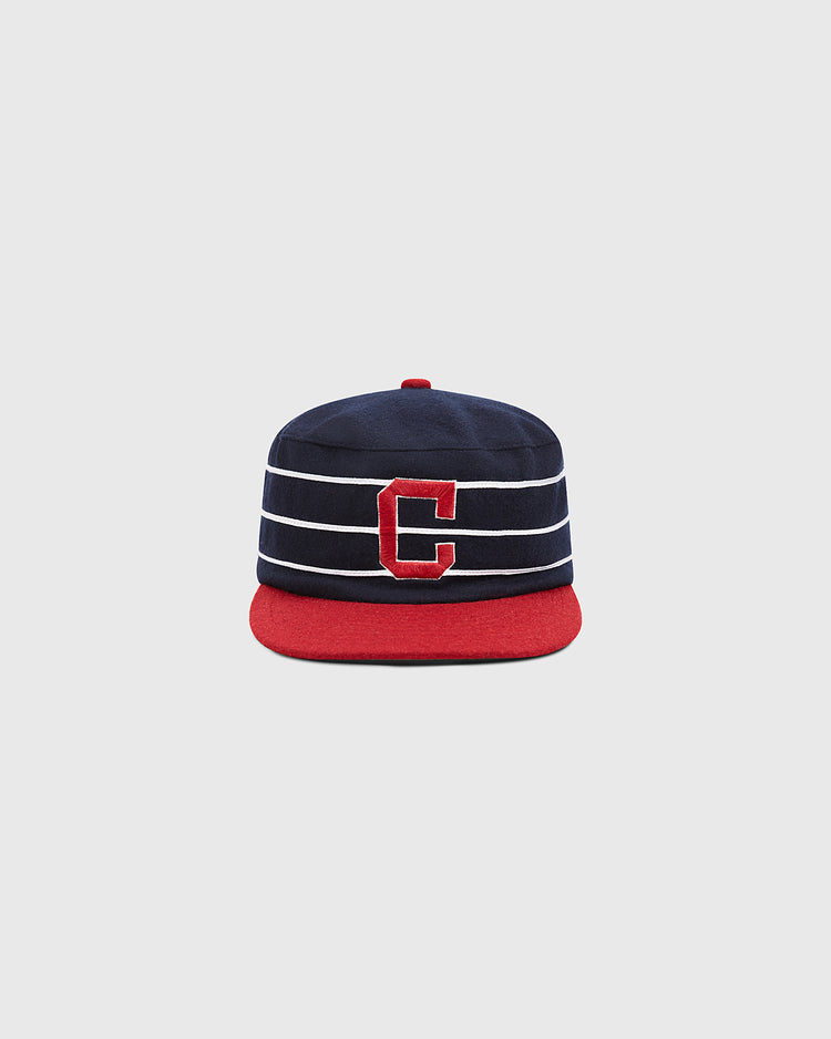 The Ebbets Field Charleston Charlies Pillbox Cap is a retro-style navy blue and red hat featuring white horizontal stripes and a bold red “C” on the front, reminiscent of the classic Charleston Charlies design, shown against a simple light gray background.