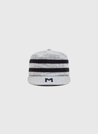 The Ebbets Field Milwaukee Brewers (AA) 1905 Pillbox Cap is a light gray vintage-style wool cap featuring two thick black horizontal stripes and a small dark blue “M” logo on the front, styled after classic Milwaukee Brewers designs. The cap is displayed on a plain white background.