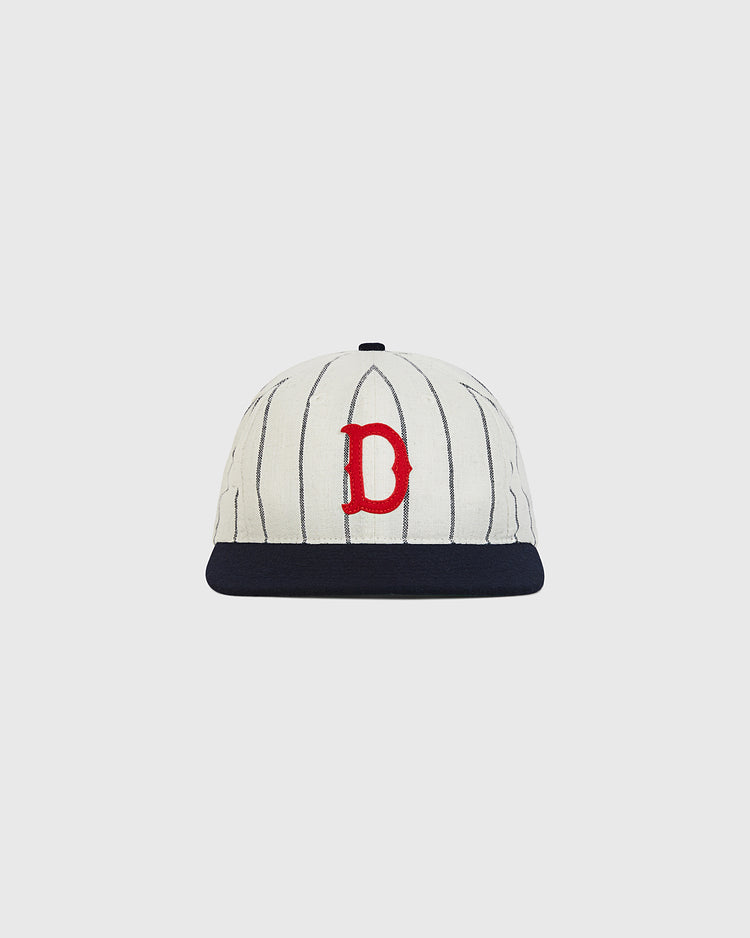 Detroit Stars 1920 Authentic Wool Ballcap by Ebbets Field, an off-white baseball cap with thin black pinstripes, a dark navy brim, and a red letter D embroidered on the front.
