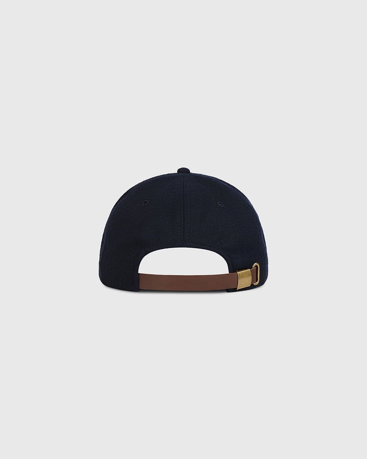 A black Chunichi Dragons 1969 Wool Ballcap by Ebbets Field is displayed from the back, showcasing a brown adjustable strap with a brass buckle against a plain light gray background—this authentic wool cap pays homage to classic Chunichi Dragons designs and their celebrated Central League championship heritage.