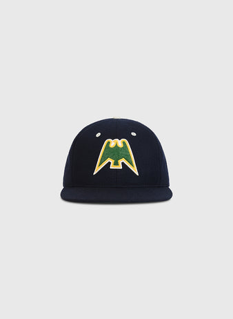 The Ebbets Field Nankai Hawks 1950 Authentic Wool Ballcap, crafted in navy blue wool and adorned with a yellow and green bat-shaped logo on the front, evokes classic Japanese baseball style and is showcased against a plain light gray background.