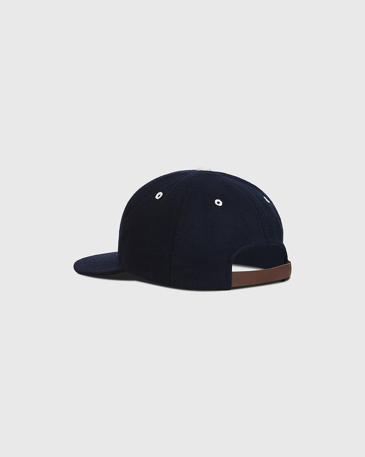 The Ebbets Field Nankai Hawks 1950 Authentic Wool Ballcap, shown from the back against a plain light gray background, features navy blue wool construction with white eyelets and a brown adjustable strap. Inspired by classic Japanese baseball.