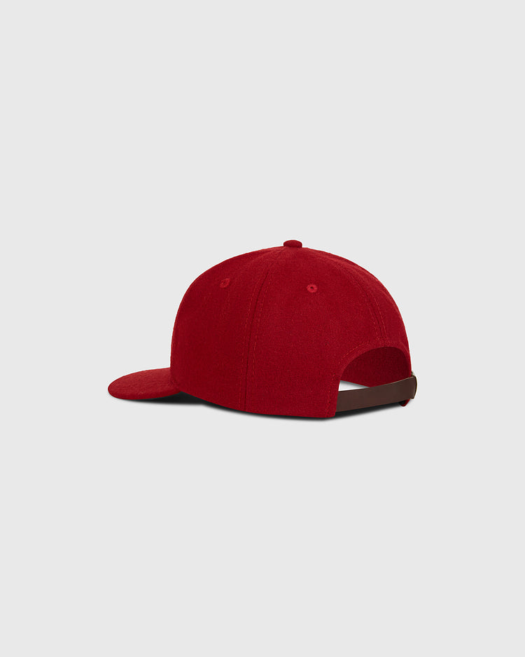 The Taiyo Cubs 1928 Authentic Wool Ballcap by Ebbets Field is shown from the back, featuring a curved brim and an adjustable strap with a dark buckle. The cap is displayed against a plain light gray background.