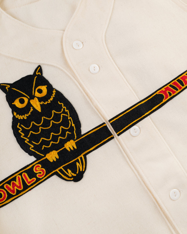 The EFF Topeka Owls 1947 Authentic Wool Home Baseball Jersey is a cream-colored button-up inspired by vintage style, featuring a black and yellow embroidered owl on a branch and 