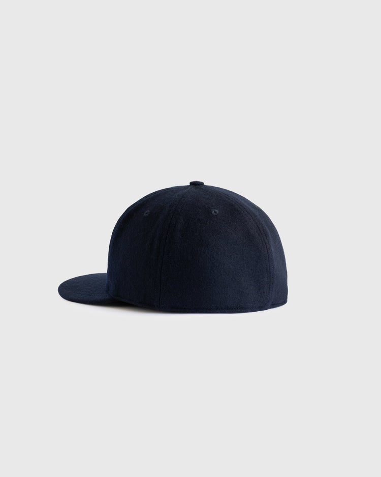 The EFF San Francisco Mission Reds 1937 Authentic Wool Ballcap features a navy blue, vintage look with a flat brim and smooth, unadorned side profile, shown against a plain light gray background.
