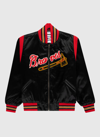 The EFF Milwaukee Braves 1957 Authentic All Satin Varsity Jacket features black satin with red and yellow accents, Braves in red script, a yellow tomahawk graphic, and striped cuffs, collar, and waistband.
