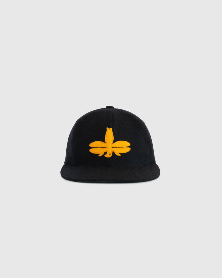 A black EFF Tombow Unions 1955 Authentic Wool Ballcap with a yellow embroidered stylized Dragonfly logo on the front, shown against a plain light gray background.
