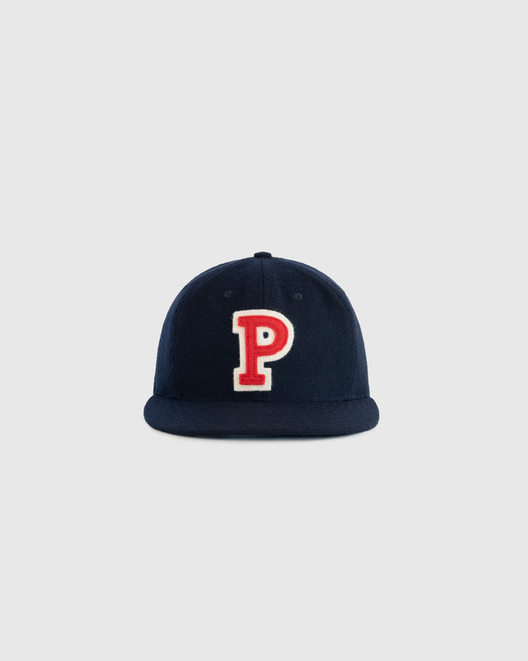 The EFF University of Pennsylvania 1958 Authentic Wool Ballcap is navy blue with a red and white 