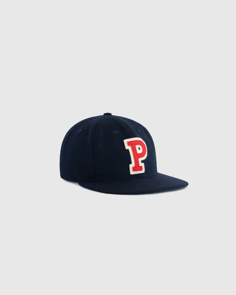 The EFF University of Pennsylvania 1958 Authentic Wool Ballcap is a navy blue cap featuring a red and white embroidered 