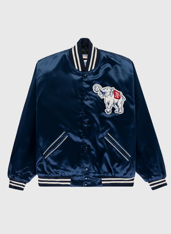 The EFF Philadelphia Athletics 1953 Authentic All Satin Varsity Jacket is navy blue with white striped cuffs, collar, and hem. It sports a white elephant patch with red A’s logo on the chest and two front pockets, honoring classic Athletics style.