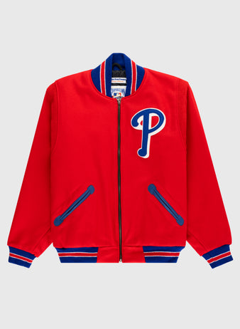 The EFF Philadelphia Phillies 1949 Authentic All Wool Varsity Jacket is bright red with blue and white striped cuffs, collar, hem, a blue and white P patch on the chest, and blue-trimmed pockets. Shown on a light gray background.