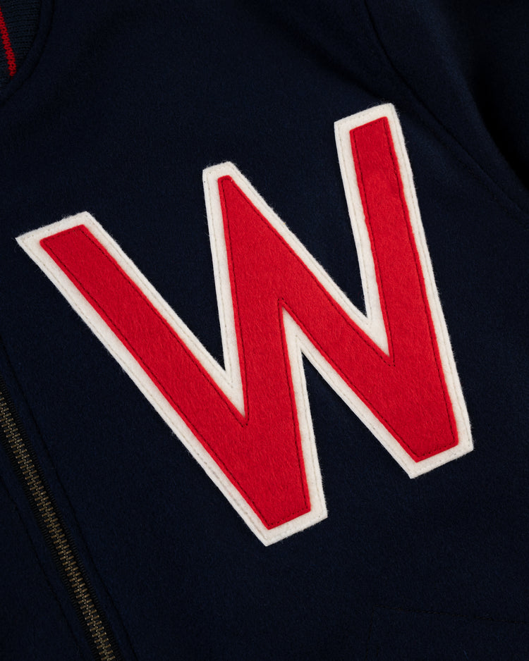 Close-up of the EFF Washington Senators (Nationals) 1951 Authentic All Wool Varsity Jacket in dark blue, featuring a bold red W with white outline and visible zipper—classic varsity style inspired by the 1951 team.
