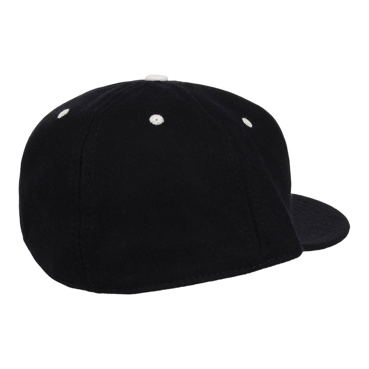 The EFF University of Kentucky Mascot Vintage Ballcap in black, shown from the back left, features white stitched eyelets and a clean, logo-free look inspired by classic college sports style.