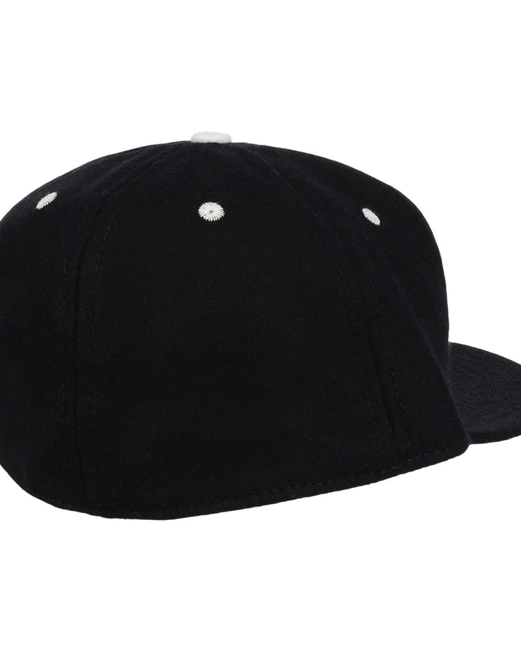 The EFF University of Kentucky Mascot Vintage Ballcap in black, shown from the back left, features white stitched eyelets and a clean, logo-free look inspired by classic college sports style.