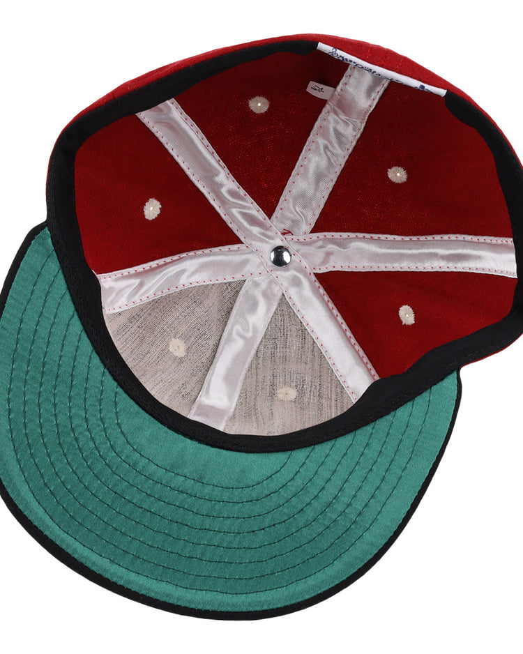 A top-down view of the EFF University of Wisconsin Mascot Vintage Ballcap, featuring a green brim, red crown, black trim, and white interior lining—ideal for Wisconsin Baseball and Big Ten fans.
