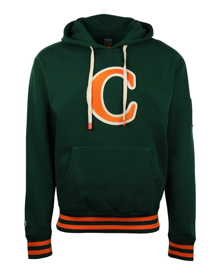 The Carrots Arlington Heights Collection Hoodie by EFF features dark green fabric, a bold orange and white C on the chest, white drawstrings, a front pocket, and orange-striped cuffs—ideal for Arlington Heights Carrots fans.