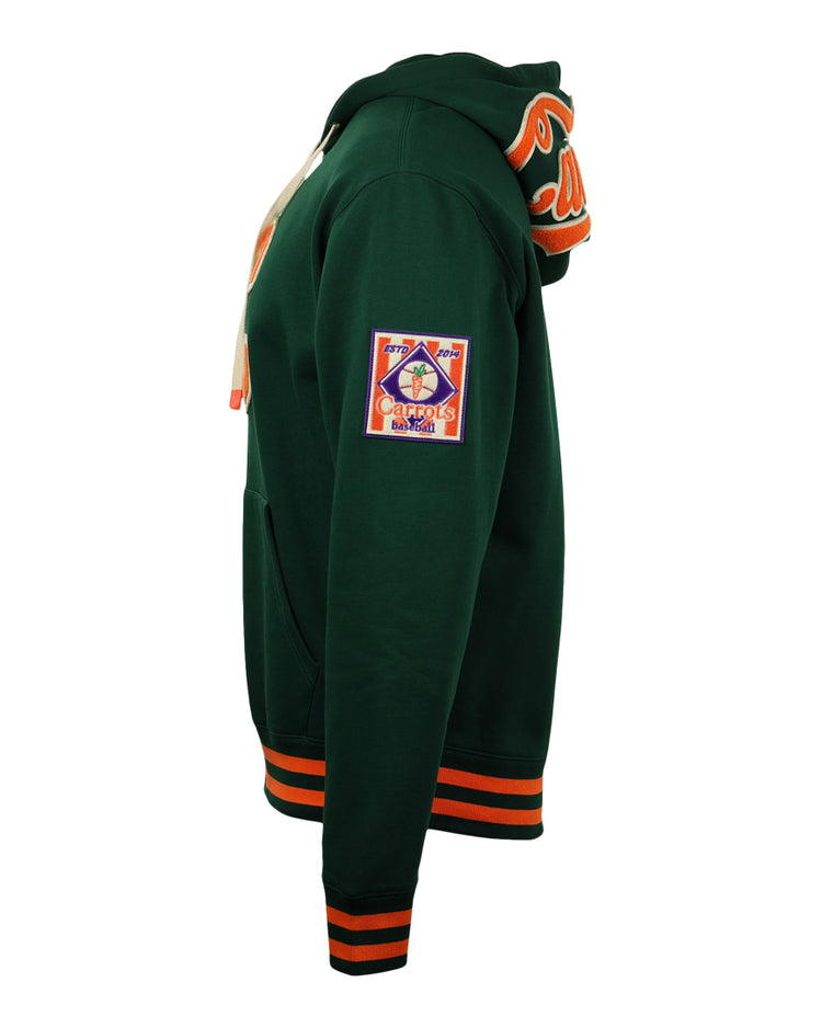 The EFF Carrots Arlington Heights Collection Hoodie features dark green fabric, orange and black striped cuffs and waistband, a “Cardinals” sleeve patch, and orange Cardinals text on the hood inspired by classic Ebbets Field Flannels style.