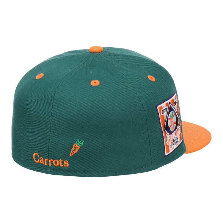 The EFF Carrots Arlington Heights Collection Logo Fitted Ballcap is green with orange accents, an orange button and brim, star side patch, and Carrots text plus carrot graphic on the back. Part of the Carrots Ebbets Field Flannels collection.
