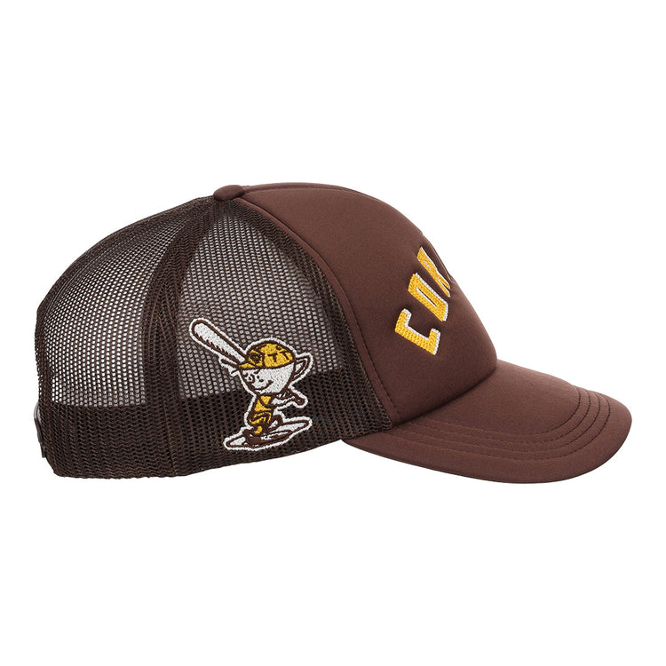 The EFF Cordoba Cafeteros EFF DNA Trucker is a brown mesh, vintage-inspired hat featuring yellow embroidery and a cartoon baseball player patch, evoking classic Mexican League and Ebbets Field Flannels style.