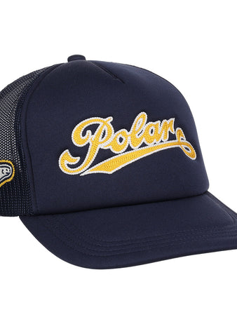 The EFF Cerveceria Polar EFF DNA Trucker is a navy vintage-style cap featuring Polar in yellow script on the front and a small embroidered polar bear on the mesh side panel, inspired by classic Ebbets Field Flannels.