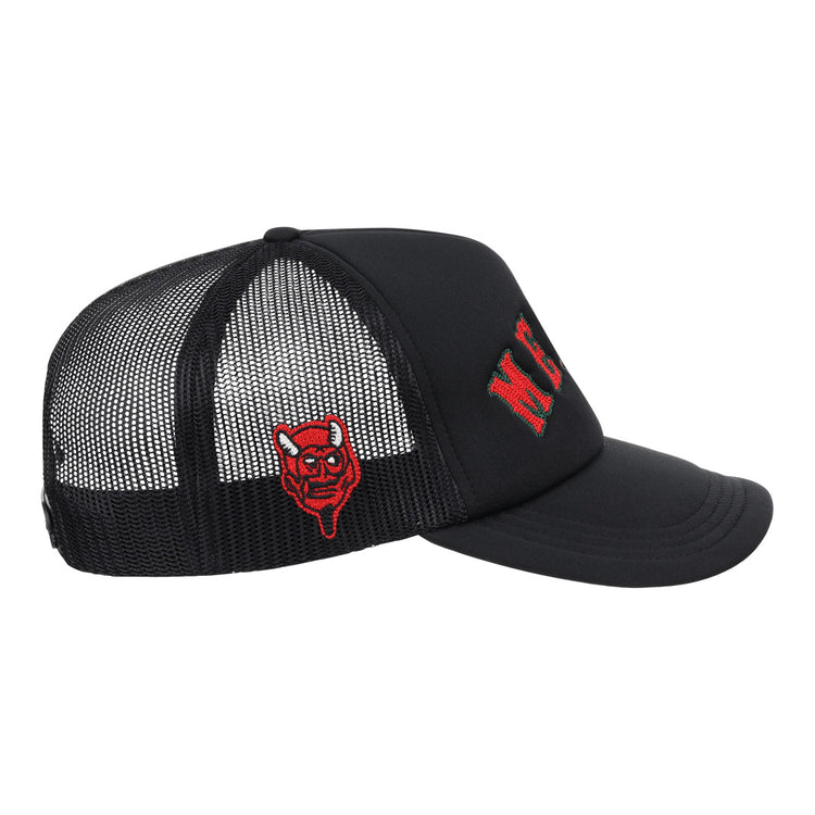 The Mexico Diablos EFF DNA Trucker by EFF is a vintage-inspired black mesh hat with “M.C.” embroidered in red on the side and a small red cartoon devil face patch on the mesh panel.