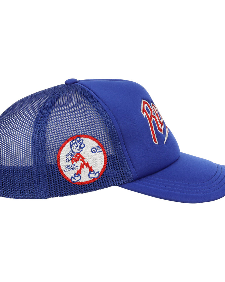 A blue mesh trucker cap by EFF, the Reddy Kilowatt EFF DNA Trucker, features chain-stitched embroidery on the front and a round side patch with a baseball, red zigzag, and cartoon glove design.