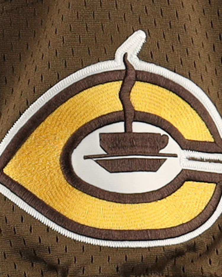 The Cordoba Cafeteros EFF DNA Replica V-Neck Mesh Jersey by EFF features a brown and gold embroidered Cafeteros C logo with a white coffee cup and steam, set on brown mesh—honoring Mexican pro baseball heritage.