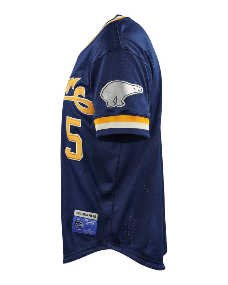 The EFF Cerveceria Polar EFF DNA Replica V-Neck Mesh Jersey features navy blue mesh, yellow and white trim, a number 5 on the side, a white polar bear patch on the sleeve, and an official label sewn by the bottom hem.