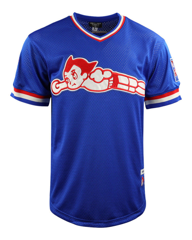 The EFF Sankei Atoms DNA Replica V-Neck Mesh Jersey is a blue Japanese Central League-inspired baseball jersey with a cartoon character on the chest, red and white sleeve and collar accents, and a patch logo on the left sleeve.