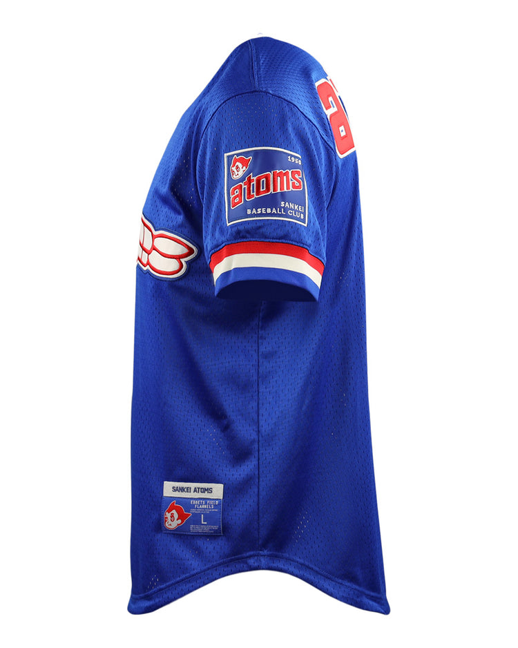 Side view of the EFF Sankei Atoms EFF DNA Replica V-Neck Mesh Jersey in blue with red and white accents, atoms on the front, a baseball club logo on the sleeve, and a size L label near the hem.