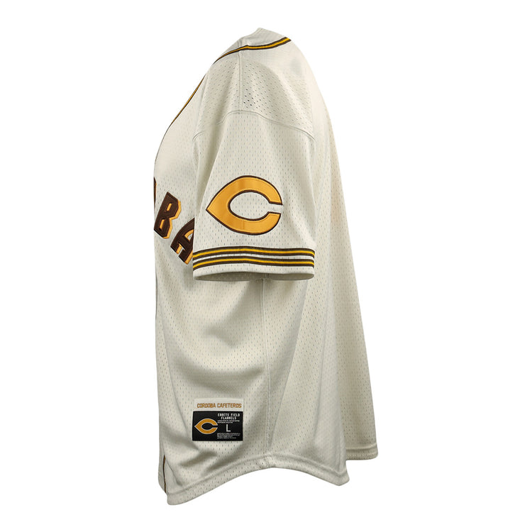 The EFF Cordoba Cafeteros DNA Replica Button-Up Mesh Jersey features yellow and brown trim, a C on the sleeve, and a Cooperstown Collection patch, honoring Cafeteros and Mexican pro baseball history. Displayed side view on a mannequin.