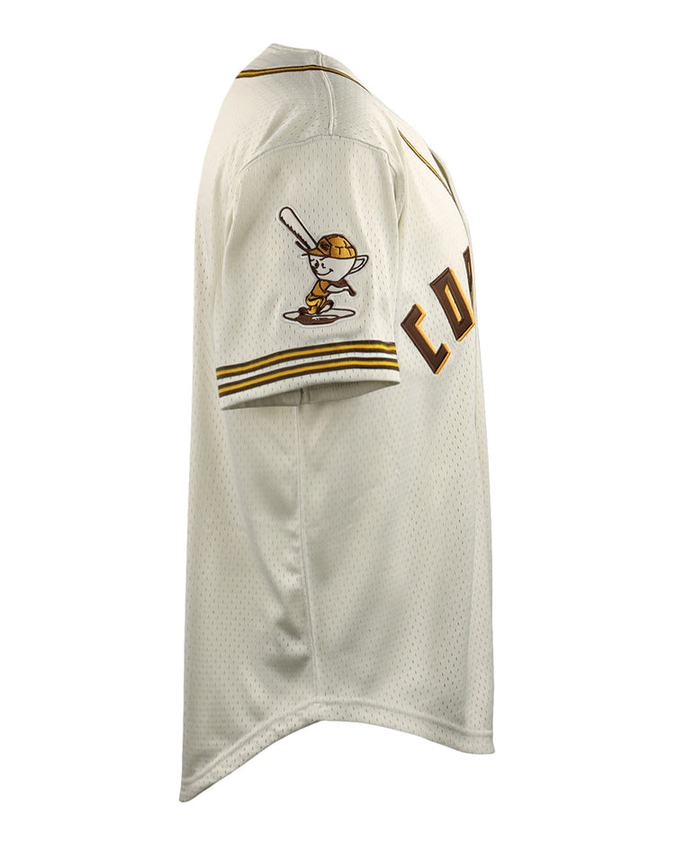 Side view of a white Cordoba Cafeteros EFF DNA Replica Button-Up Mesh Jersey by EFF, with yellow and brown trim, COUNT partially visible on the front, and a cartoon batter on the sleeve, inspired by Mexican baseball history.