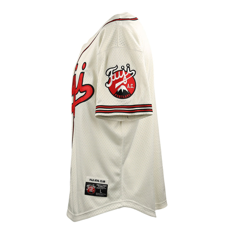The EFF Fuji Athletic Club DNA Replica Button-Up Mesh Jersey features a cream color, red and black striped sleeves and collar, a Fujis A.C. legacy patch on the sleeve, and two rectangular tags near the bottom hem.