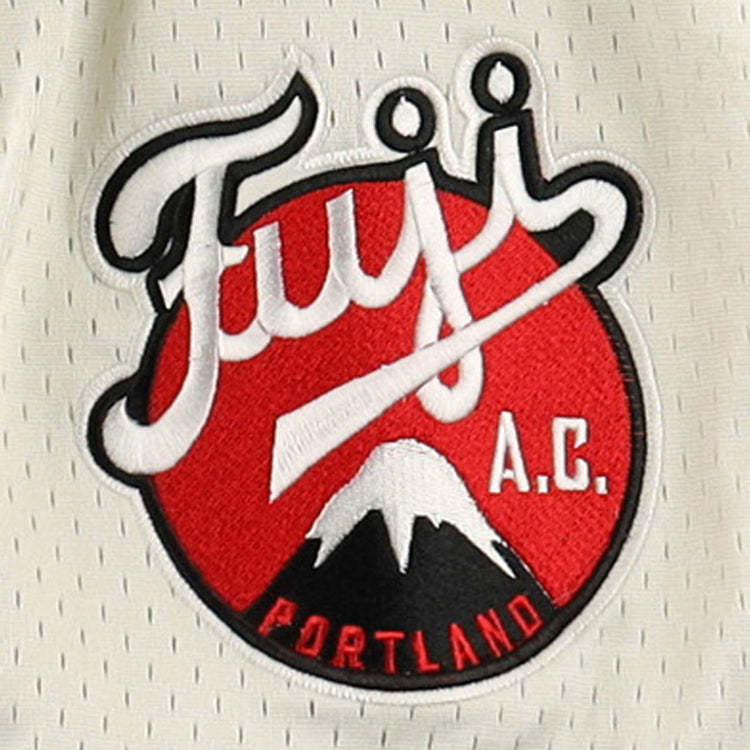 A circular patch on the Fuji Athletic Club EFF DNA Replica Button-Up Mesh Jersey by EFF shows stylized Fujis A.C. over red, with a white mountain and Portland at the bottom—honoring Portland Fuji and Japanese baseball heritage.